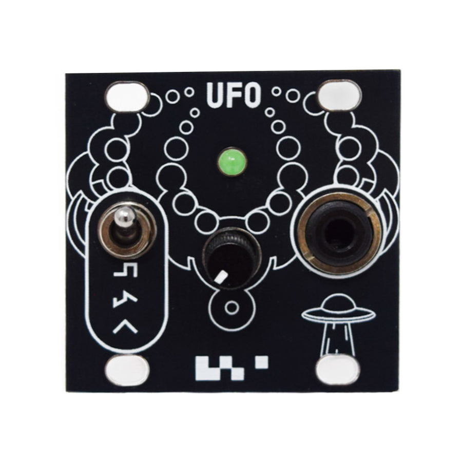 Small black electronic module with a toggle switch, rotary knob, audio jack, green LED, and UFO graphic.