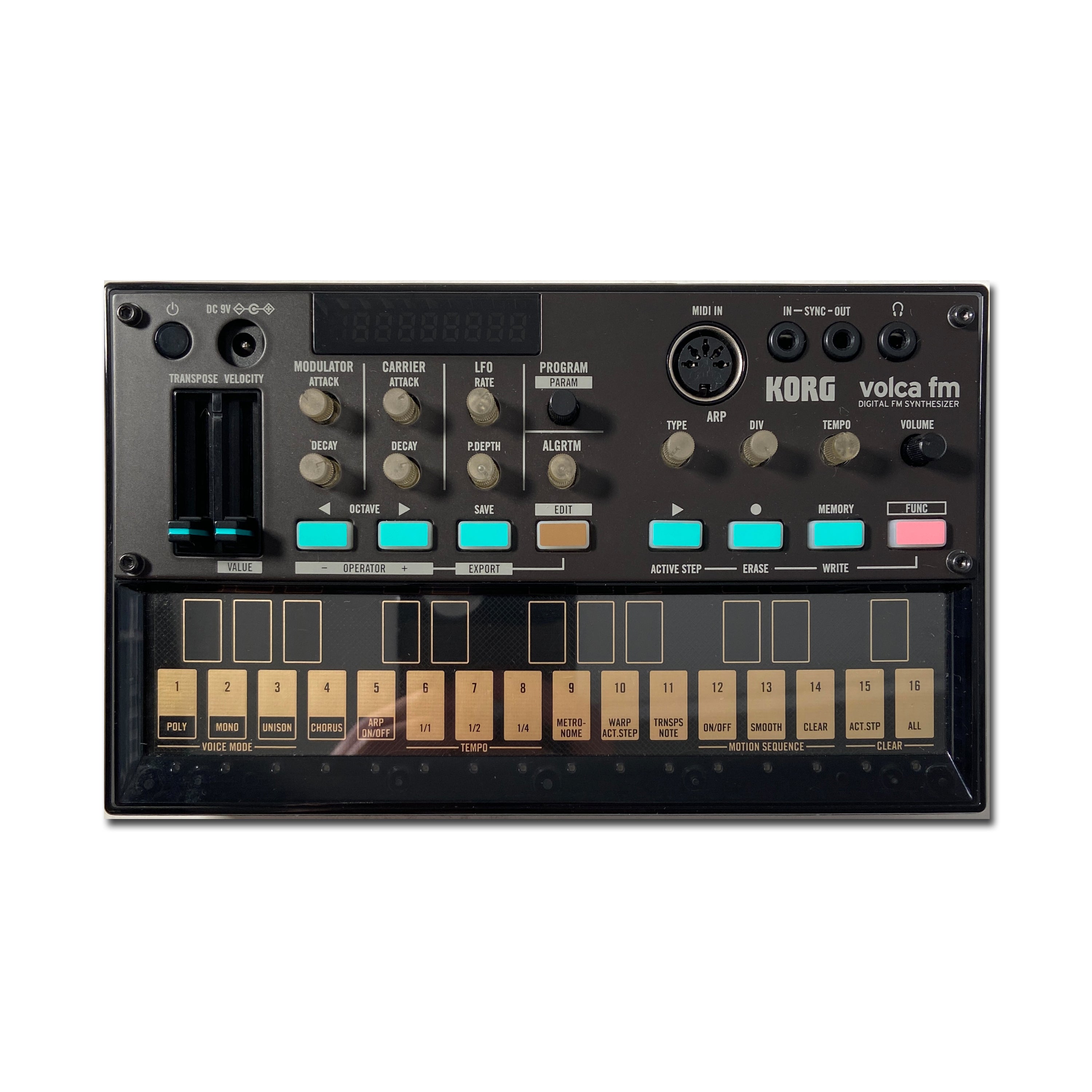Top view of a Korg Volca FM digital FM synthesizer with knobs, buttons, keys, and various input/output ports.