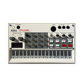 Top view of a white Korg volca sample digital sample sequencer with buttons, knobs, a display, and various input/output ports.