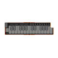 Orange foldable electronic keyboard controller with buttons and sliders for pitch, modulation, and other controls.