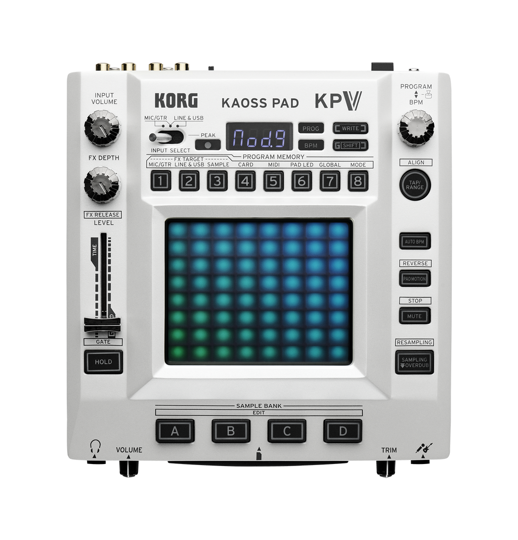 Top view of a Korg Kaoss Pad KP V MIDI controller with various knobs, buttons, a lit-up touchpad, and input/output jacks.