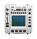 Top view of a Korg Kaoss Pad KP V MIDI controller with various knobs, buttons, a lit-up touchpad, and input/output jacks.