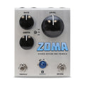 Silver guitar effects pedal with three knobs, toggle switch, two footswitches, and blue LED labeled ZOMA stereo reverb and tremolo.
