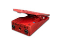 Red Tech 21 wah pedal with input, output, and 9V DC power jacks visible at front