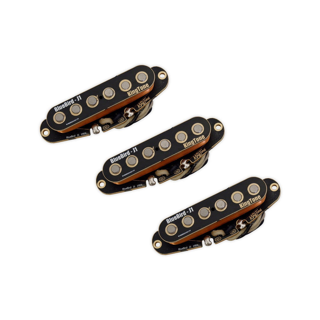 Three black guitar pickup coils with copper wire and labels including BlueBird - J1 and KingTone.