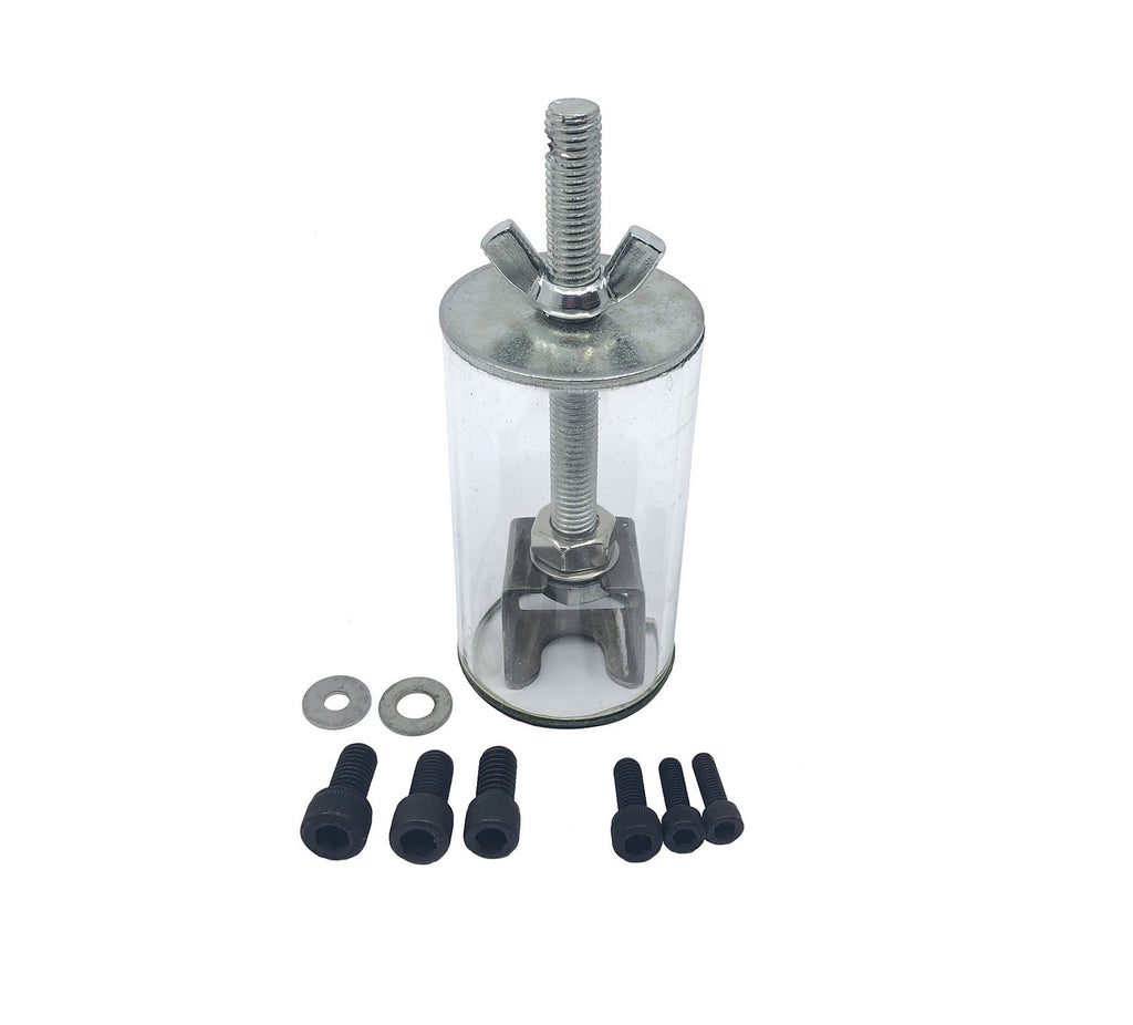 A metal puller tool with a glass cylinder, wing nut, washers, and several black hex bolts on a white background.