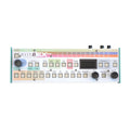 Top view of a Kodamo Mask1 EX MK2 bitmask synthesizer with multiple buttons, knobs, and a small digital display.