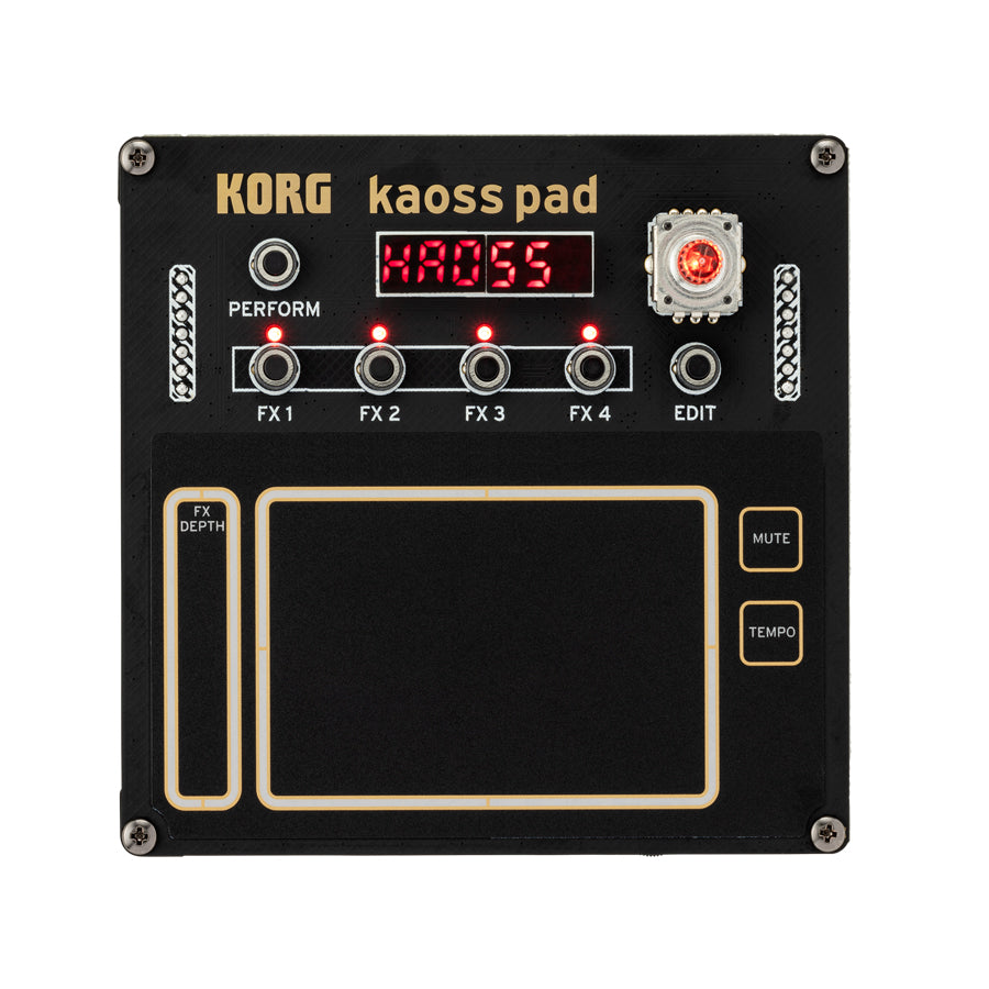 Black Korg Kaoss Pad with buttons, a rotary encoder with red LED, and a touchpad control area.