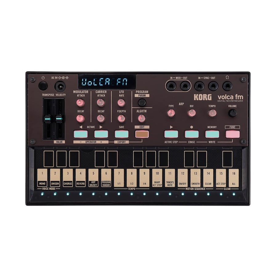 Top view of a Korg Volca FM synthesizer with control knobs, buttons, and a small keyboard.