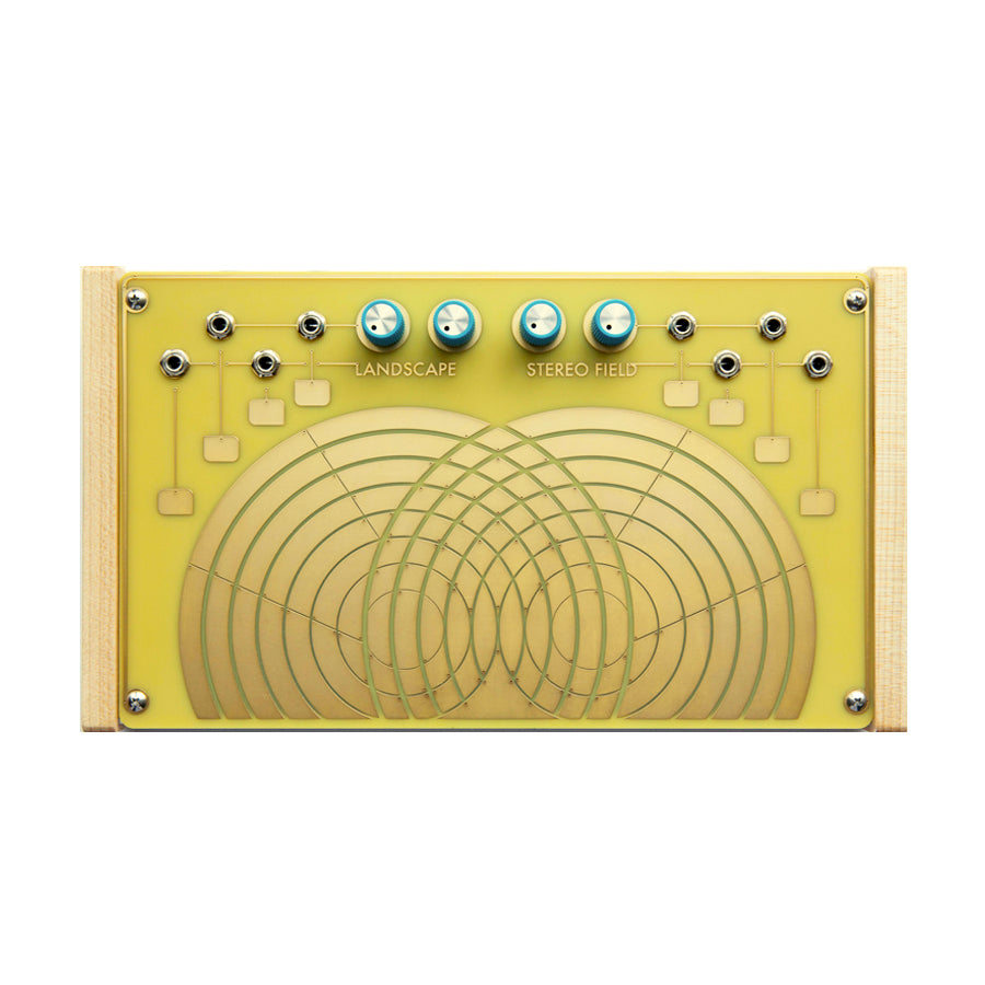 Yellow electronic device with a wood frame, four blue knobs, and multiple 1/4 inch jack connectors labeled Landscape Stereo Field.