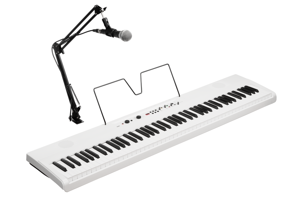 White keyboard with black and white keys, music stand, and attached microphone on adjustable black arm stand.