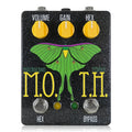 Black guitar effects pedal with yellow knobs, moth graphic, and labeled controls for volume, gain, and hex.