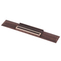 A rosewood classical style guitar bridge with multiple string holes and a cream-bordered saddle.