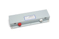 Gray metal reverb tank with red and white binding post connectors and a label showing model and date information.