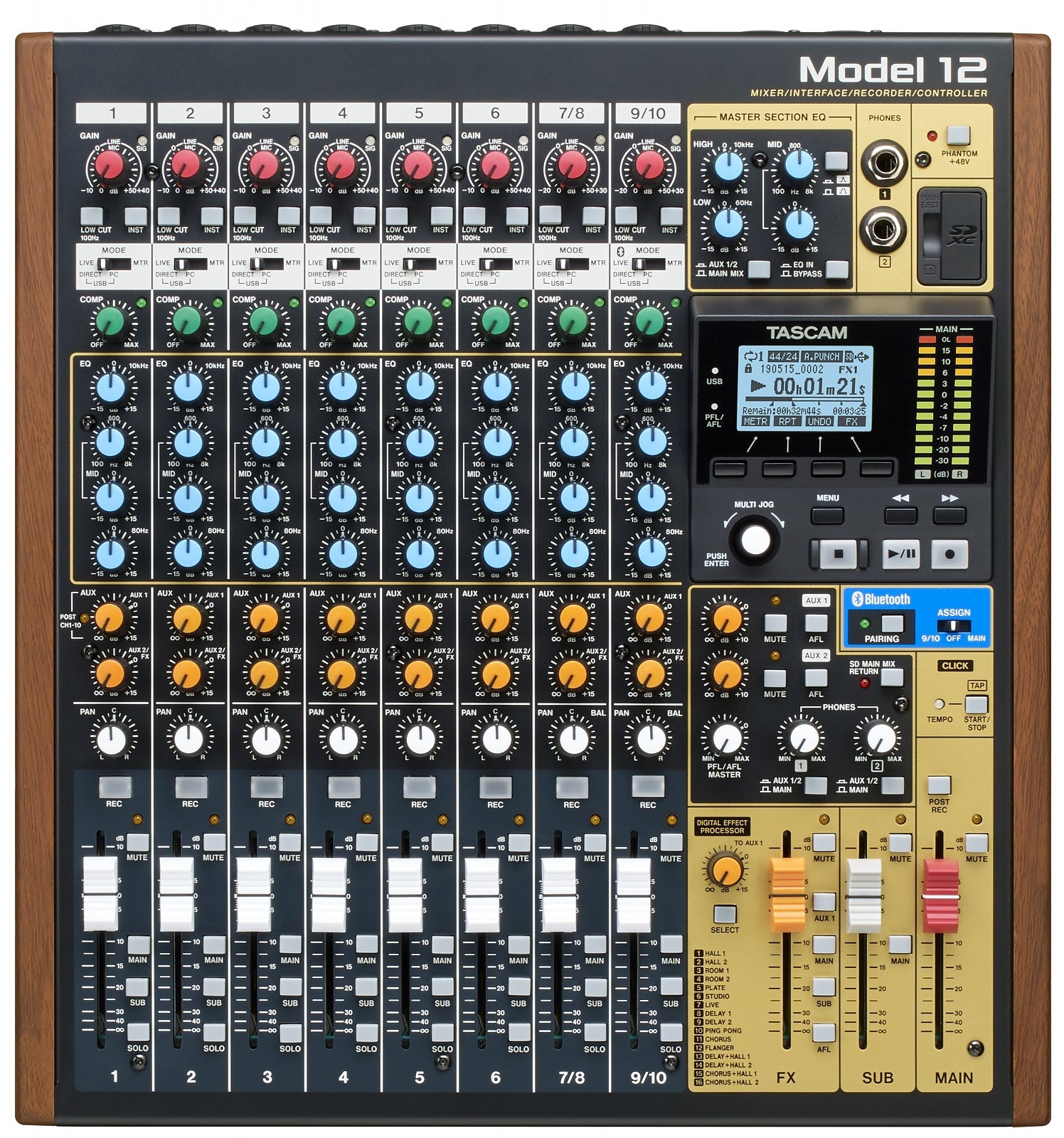 Top view of a Tascam Model 12 audio mixer with knobs, faders, buttons, headphone jacks, and an LCD screen.