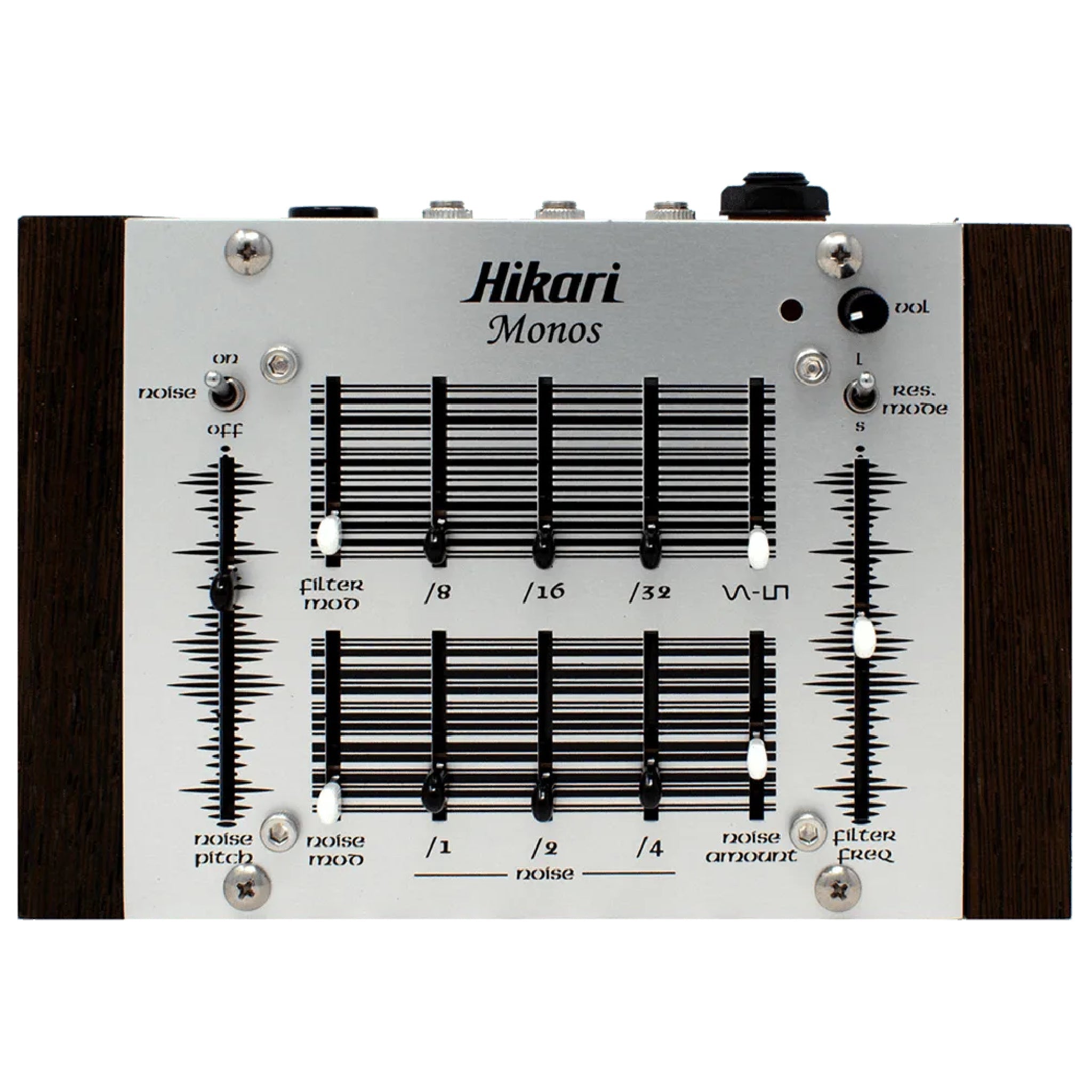 Top-down view of a Hikari Monos synthesizer with sliders, toggle switches, rotary knob, and 3.5mm jacks on a wood-sided metal panel.