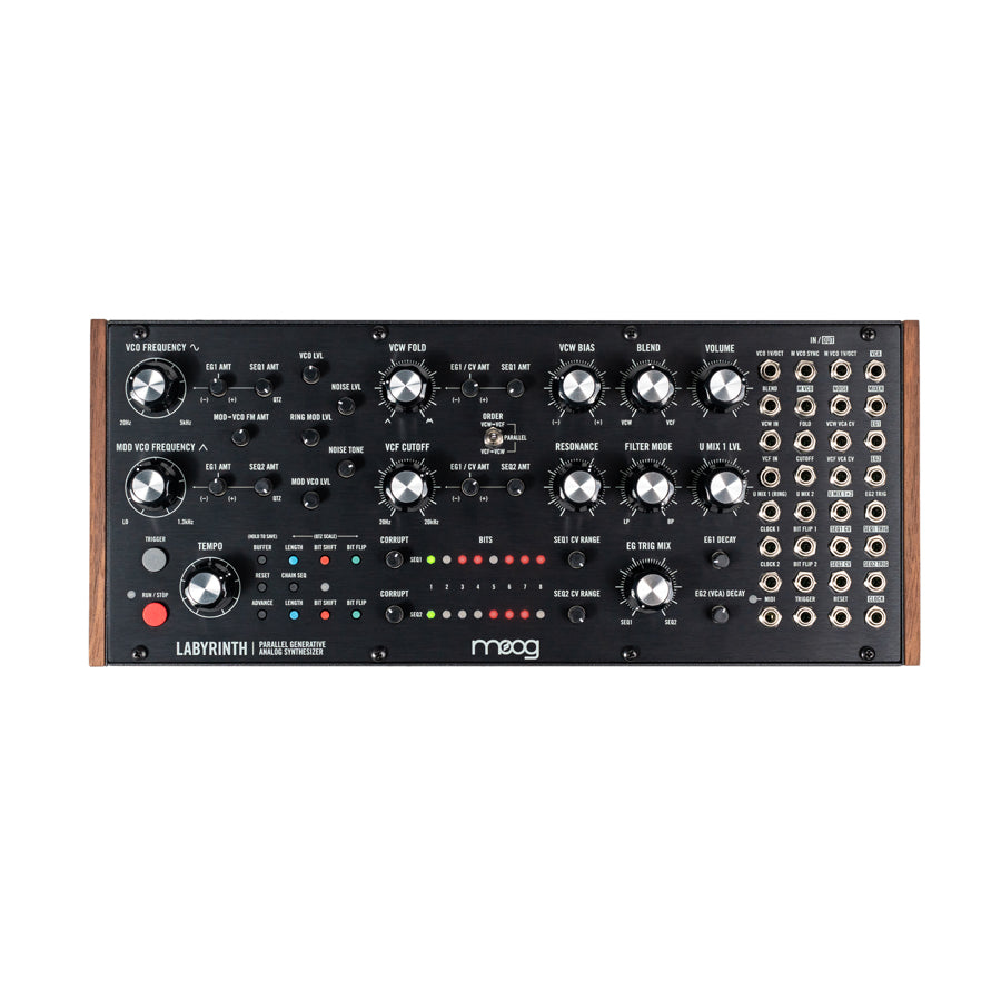 Black analog synthesizer panel with knobs, patch jacks, LED indicators, and wooden side panels.