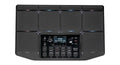 Black electronic drum controller with 10 square pads, screen, knobs, and buttons.