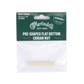 White corian nut inside green and white Martin & Co. packaging labeled pre-shaped flat bottom.