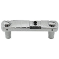 Chrome metal guitar bridge with two adjustment screws and two posts for mounting.