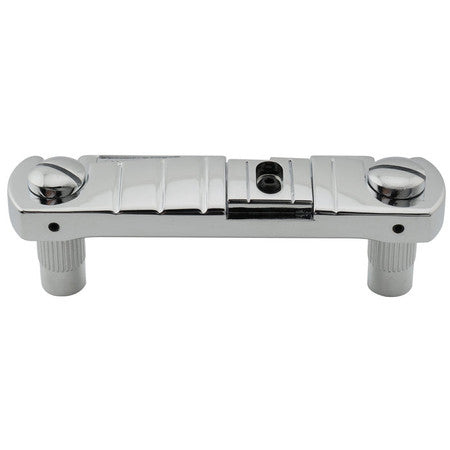 Chrome metal guitar bridge with two adjustment screws and two posts for mounting.