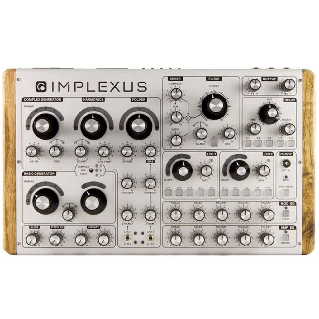 Top view of a white analog synthesizer with multiple knobs, buttons, and wooden side panels labeled Implexus.