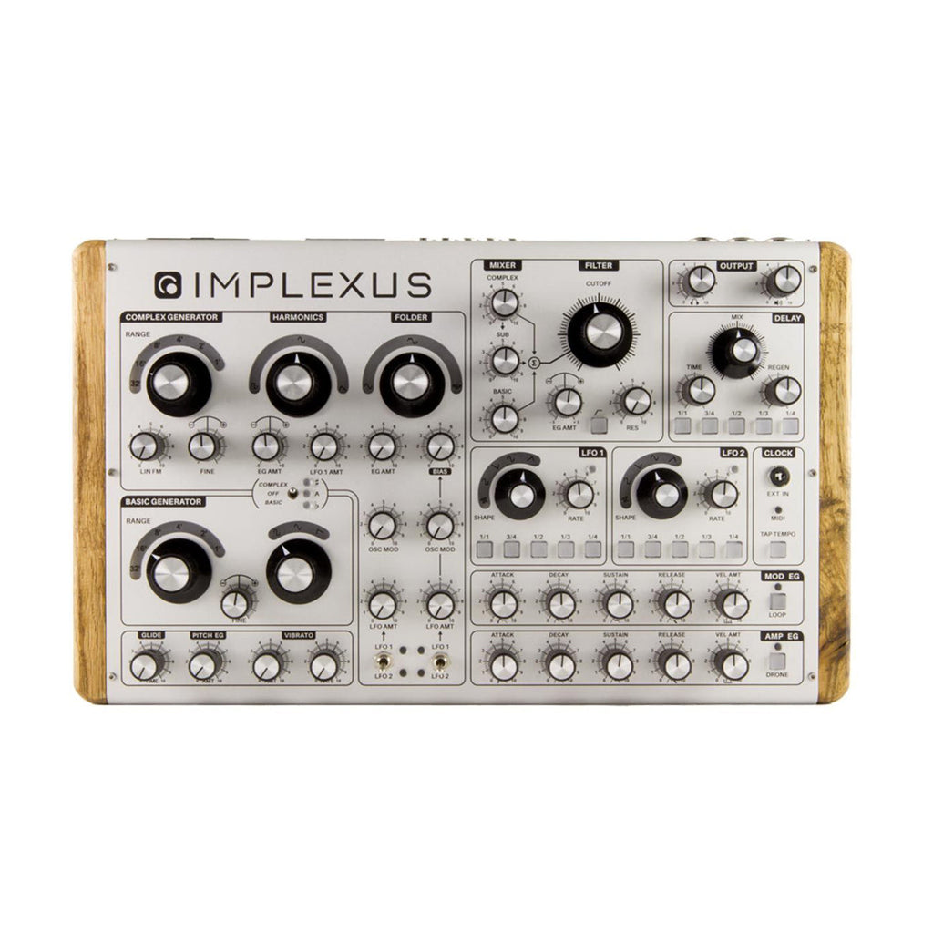 Top view of a Majella Audio Implexus synthesizer with multiple knobs and wooden side panels.