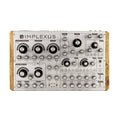 Top view of a Majella Audio Implexus synthesizer with multiple knobs and wooden side panels.
