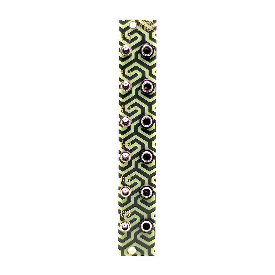 Front view of a narrow electronic module with patterned green and black surface, multiple 3.5mm jacks and push buttons.