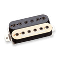 Close-up view of a Seymour Duncan zebra humbucker guitar pickup with black and cream coil covers.