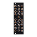 Black electronic module panel with multiple toggle switches and jack sockets connected by white lines.