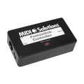 Black rectangular MIDI Solutions Footswitch Controller box with labeled 3.5mm jack connectors and a red indicator light.