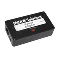 Black rectangular MIDI Solutions power adapter with input and thru connectors and a red LED indicator.