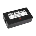 Black MIDI Solutions Velocity Converter device with labeled In and Out connectors and a red LED indicator.