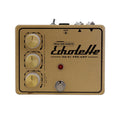 Gold guitar effects preamp pedal with three rotary knobs, toggle switch, footswitch, and two 1/4 inch jacks.