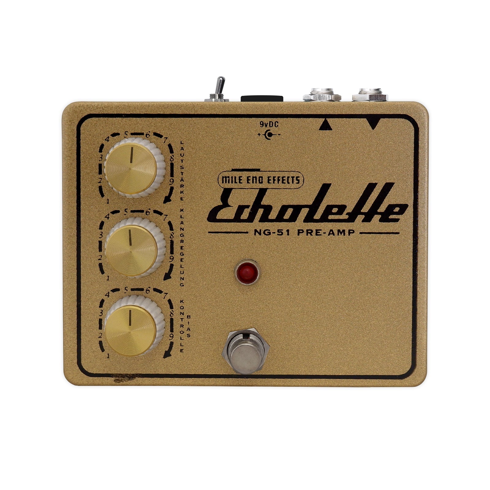 Gold guitar effects preamp pedal with three rotary knobs, toggle switch, footswitch, and two 1/4 inch jacks.