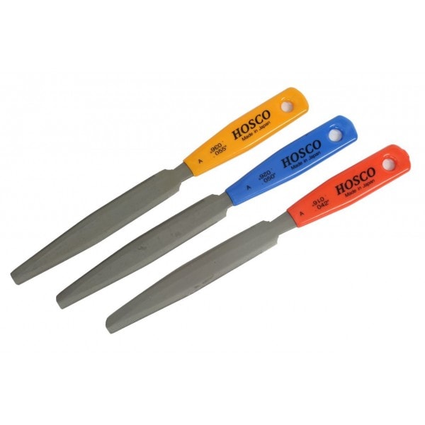 Three metal files with yellow, blue, and red handles labeled Hosco, made in Japan.