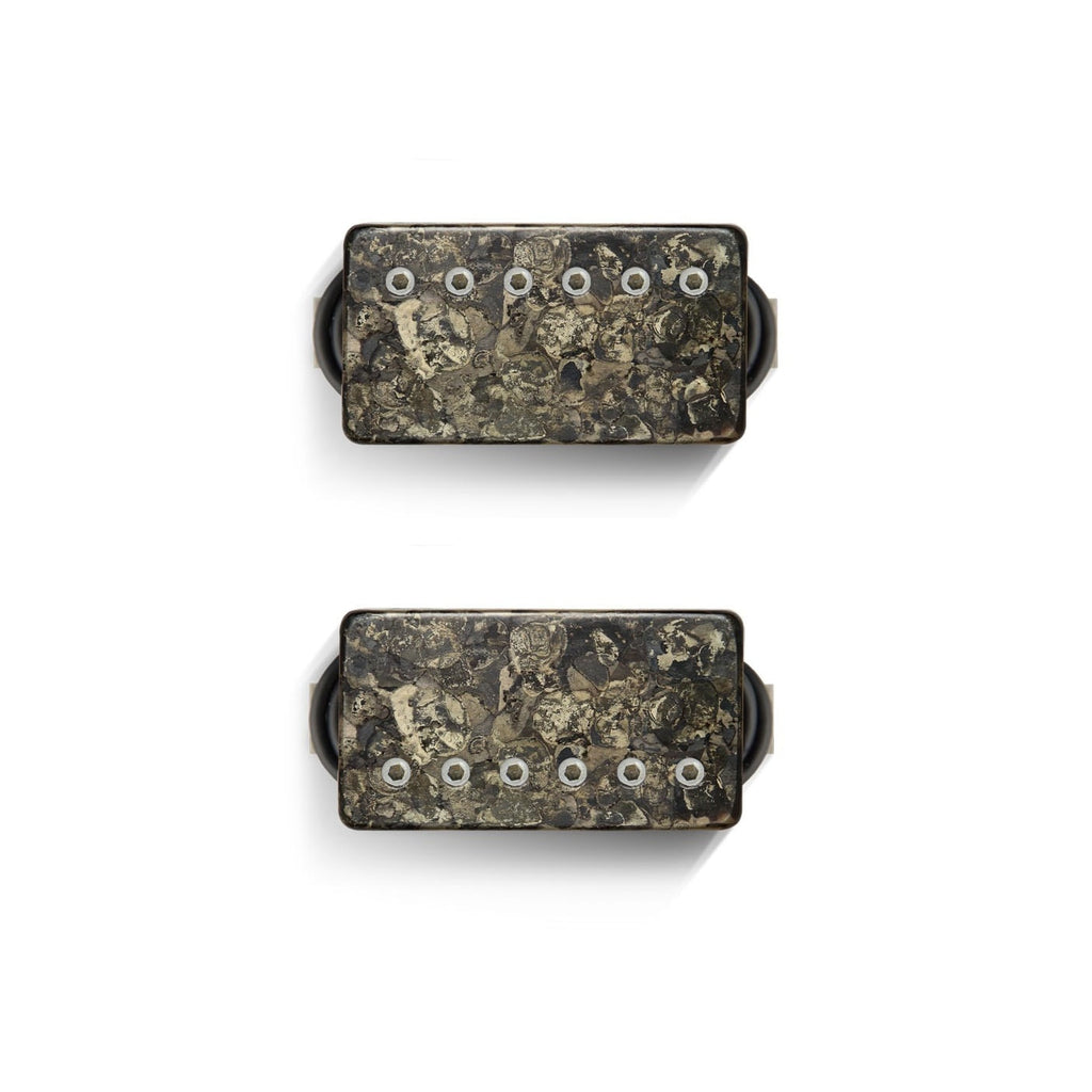 Two rectangular humbucker pickups with camo patterned covers and six metal pole pieces visible