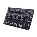 Black Eurorack module with multiple knobs, toggle switches, and 3.5mm jacks labeled Elmyra 2 by Neutral Labs.