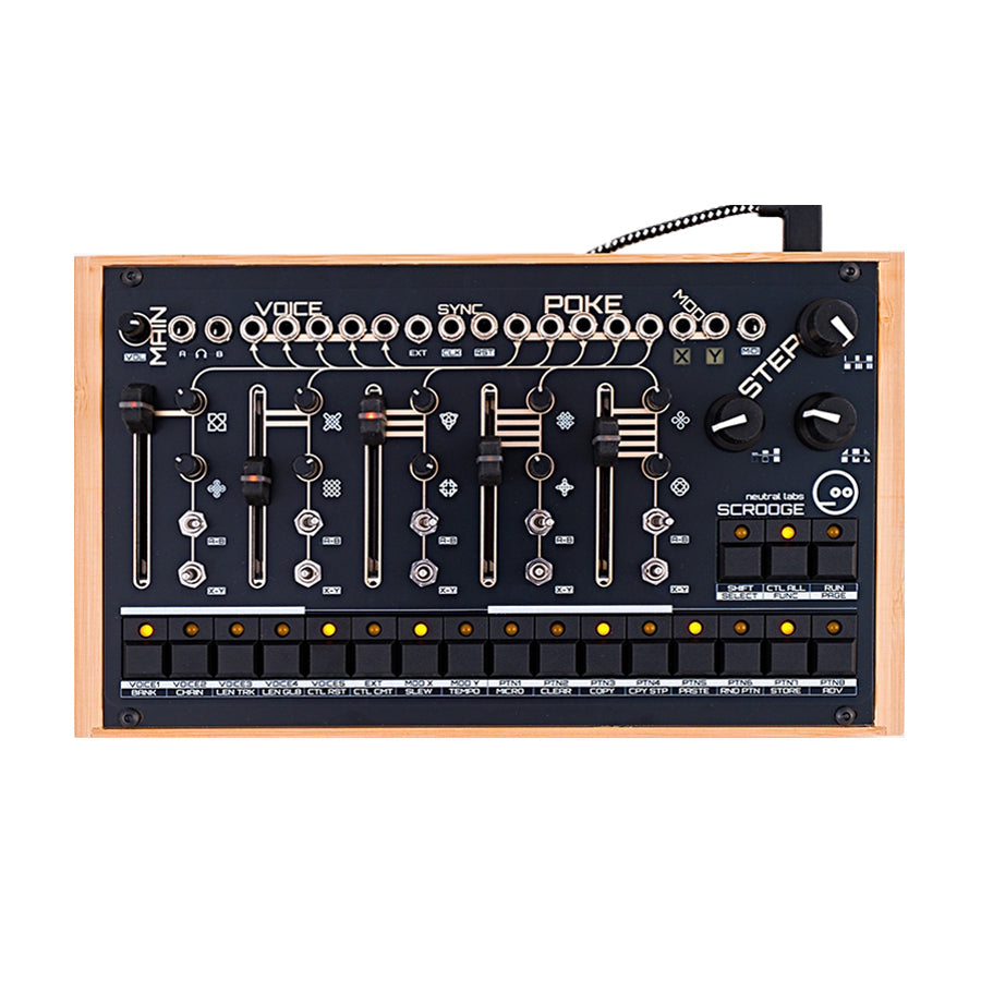 Top view of a black modular synthesizer with multiple sliders, knobs, jack inputs, and buttons in a wooden frame.