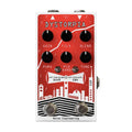 Red guitar effects pedal labeled Dystorpia with six knobs, two toggle switches, and two footswitches.
