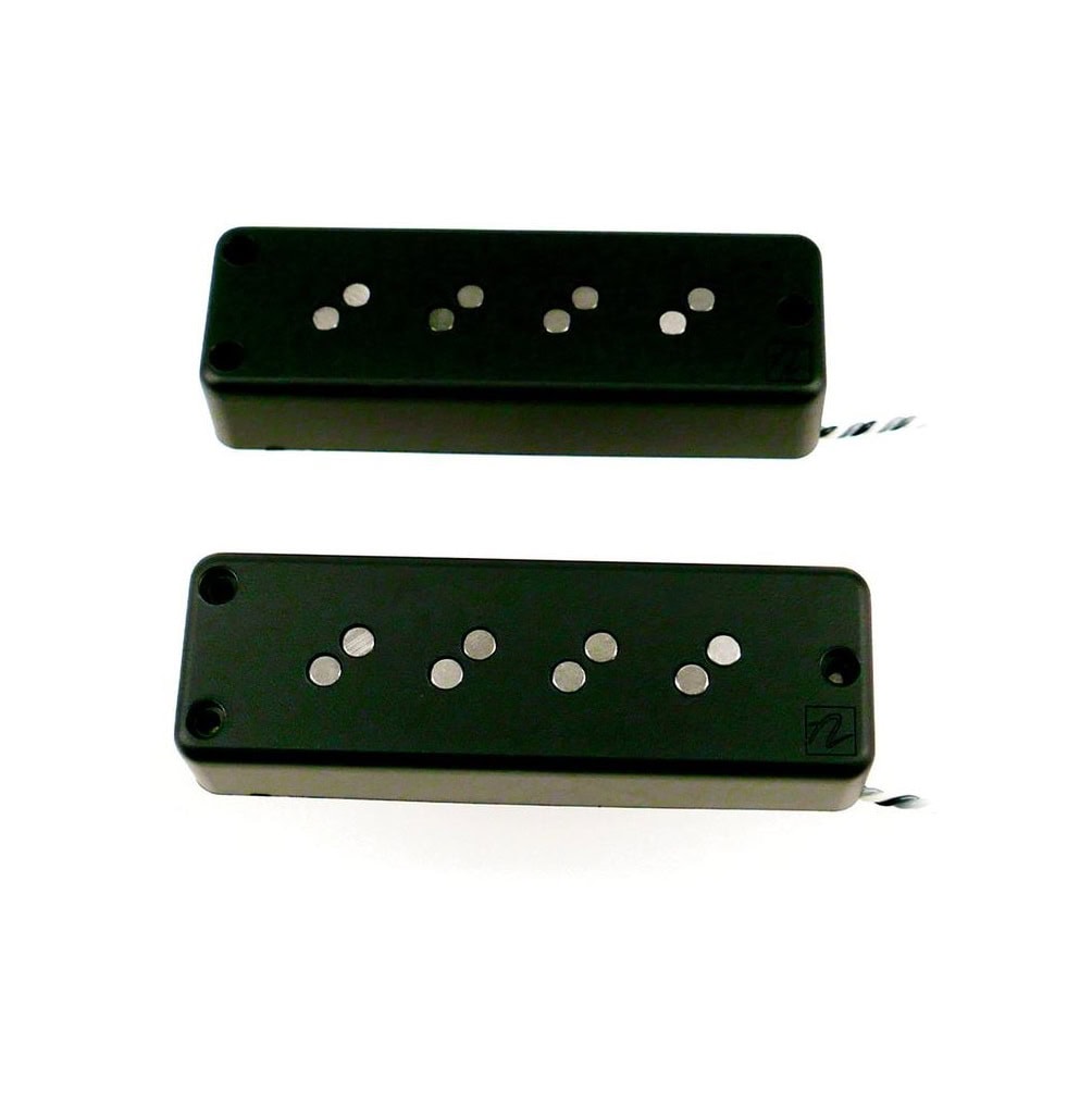 Two black rectangular soapbar-style pickups with visible pole pieces and attached twisted wires.