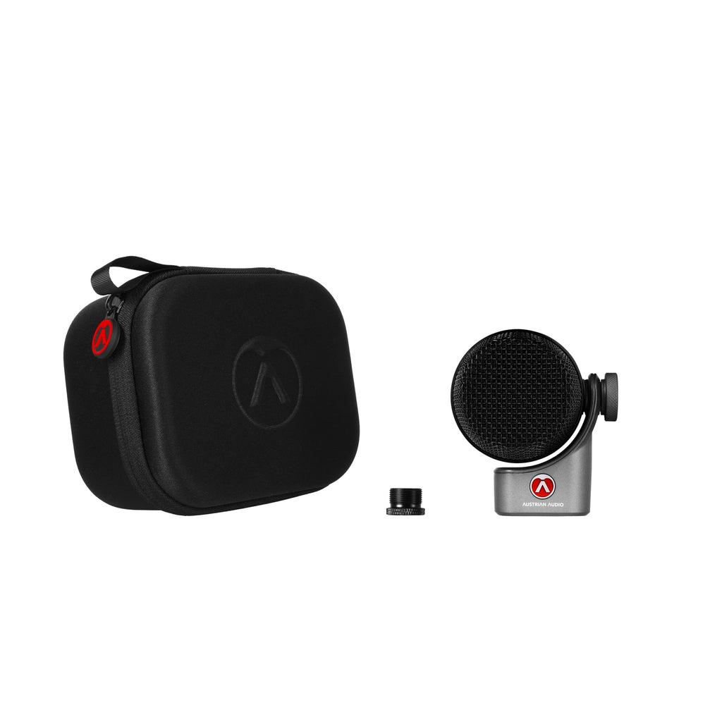 Gray and black Austrian Audio microphone with carrying case and mounting adapter shown on white background.