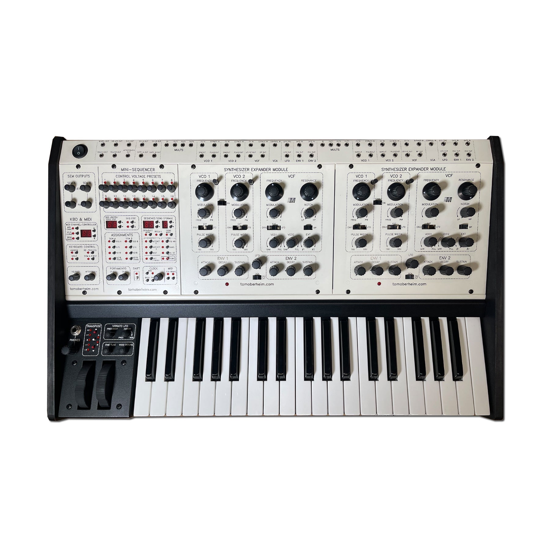 Top view of a black and white analog synthesizer keyboard with multiple control knobs and a mini-sequencer panel.