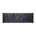 Black Oberheim TEO-5 synthesizer desktop unit with multiple knobs, buttons, and a small digital display