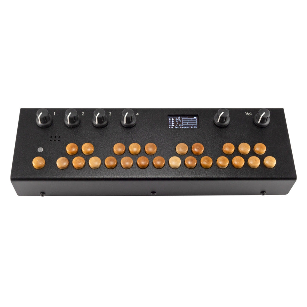 Black electronic device with wooden buttons, rotary knobs, and a small screen showing settings.
