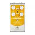 A guitar effects pedal with four rotary knobs, two toggle switches, one footswitch, and input/output jacks.