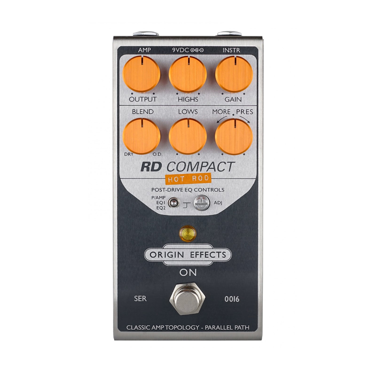 Top-view of a silver and black guitar effect pedal with seven orange knobs and a footswitch button.