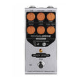 Silver guitar effects pedal with six orange knobs, two jacks, a toggle switch, and a footswitch labeled Origin Effects RevivalDRIVE Compact.