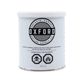 White tin can labeled Oxford Guitar Supply Co. containing 946 mL of flammable liquid lacquer.